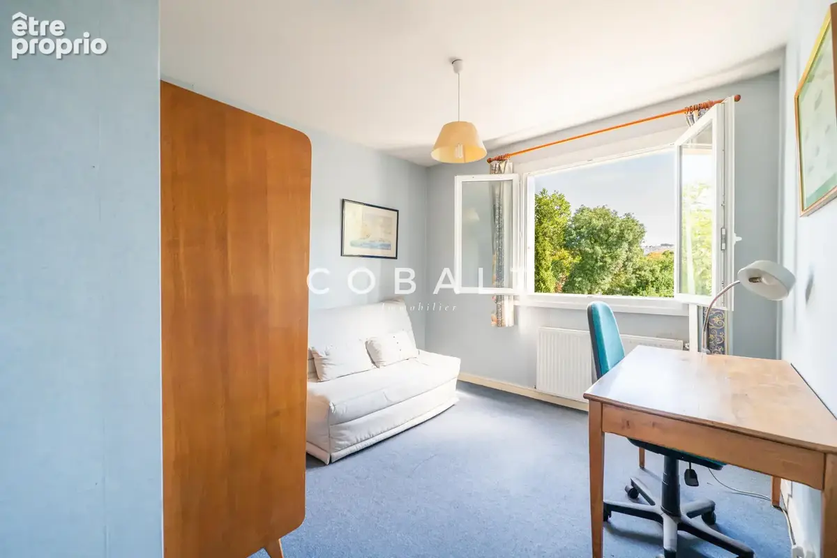 NANTES CANCLAUX   EXCLUSIVITÉ   Appartement T3 de 82 m2 en étage élevé avec balcon, grande cave de 9 m2 et par - photo 9