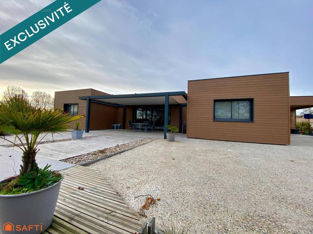 Photo 1 - Maison à SAINTE-LIVRADE-SUR-LOT