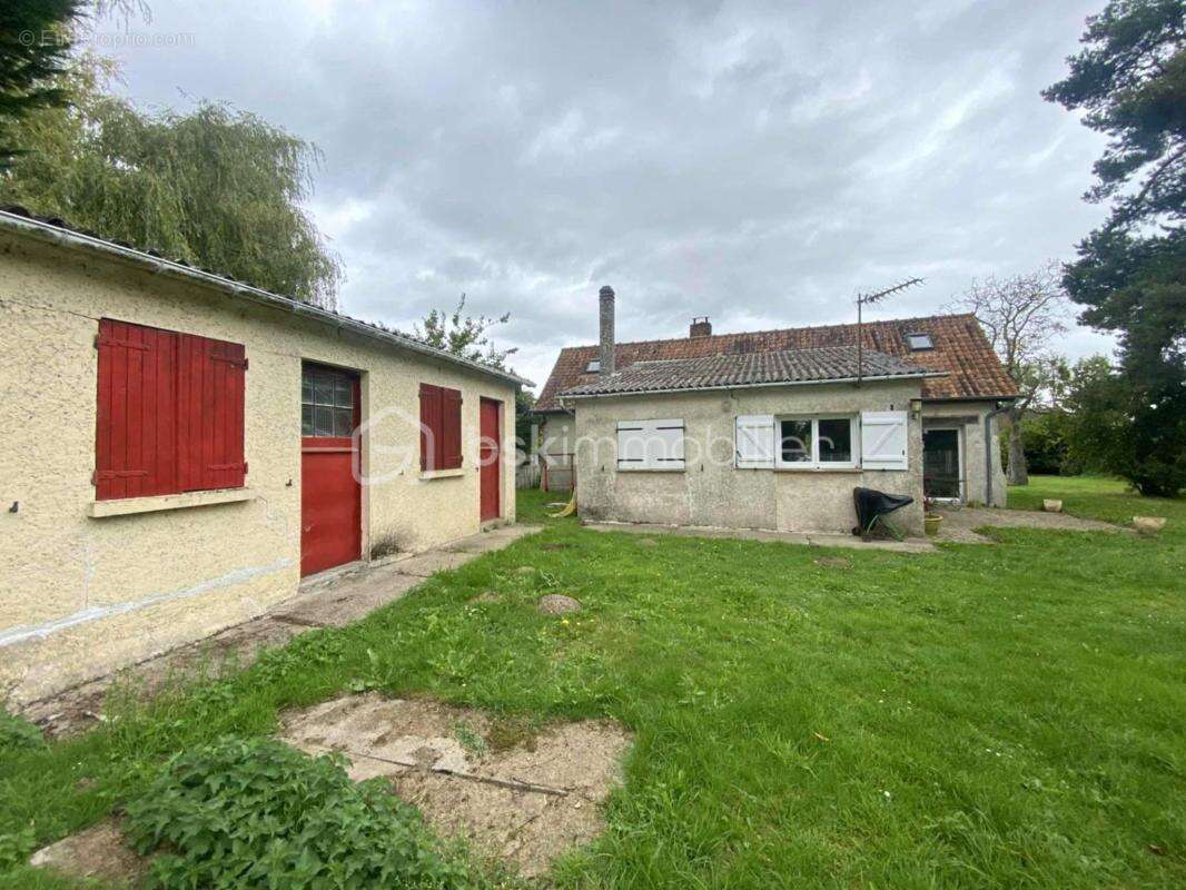 Maison de plain – pied à fort potentiel – Terrain 5000 m² – Dépendance – Grange – Garages – Cave – Piscine – Environnement calme - photo 19