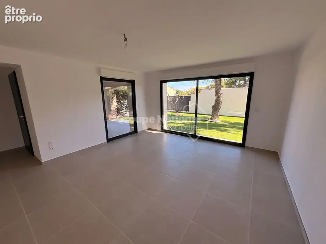 Appartement T4 de 90 m² en rez de jardin - photo 5