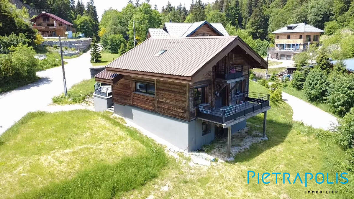 Maison 151 m² à Mijoux  - photo 7