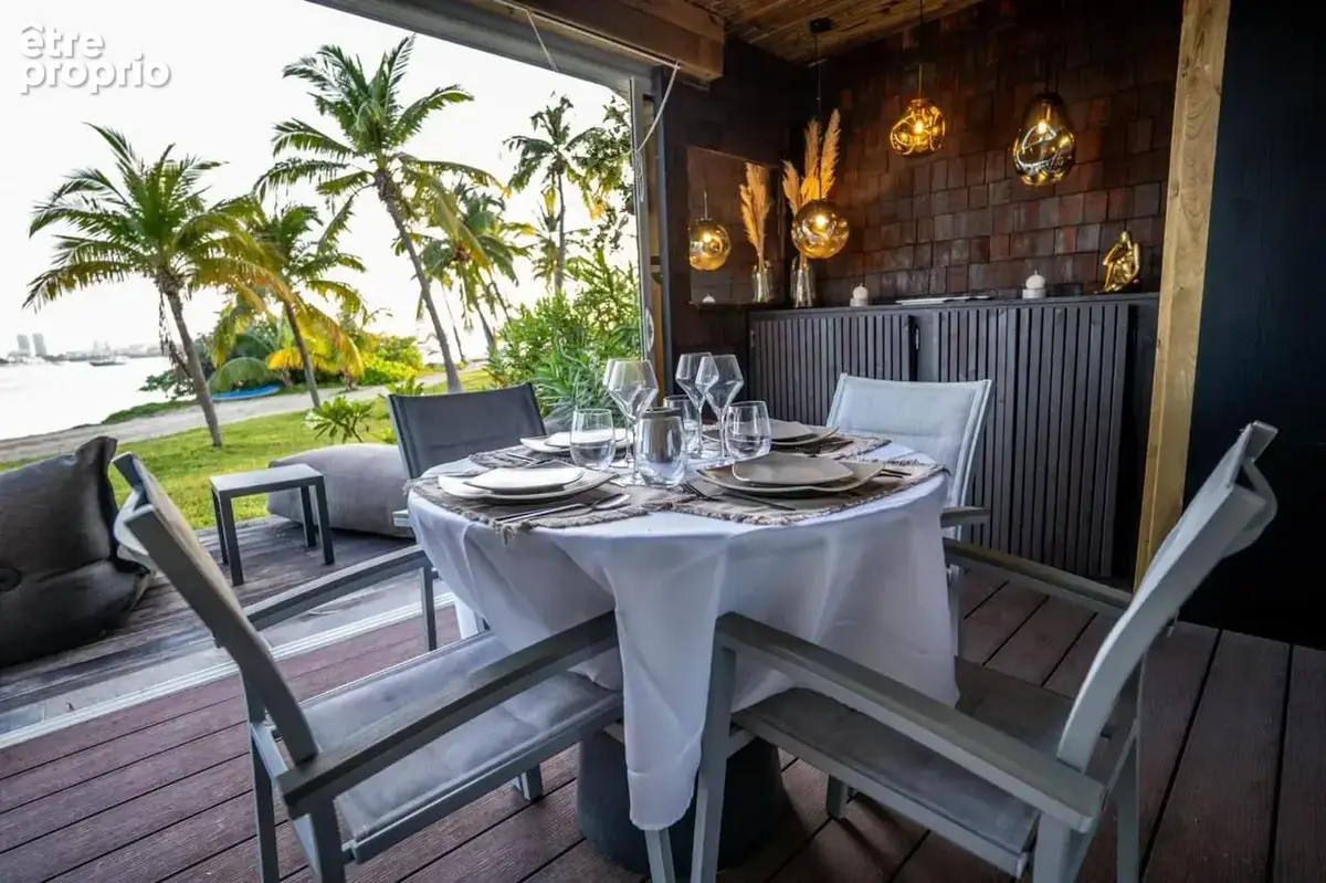 Un pied-à-terre d'exception ou un investissement performant au bord du lagon - photo 2