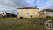 Maison à MOMUY