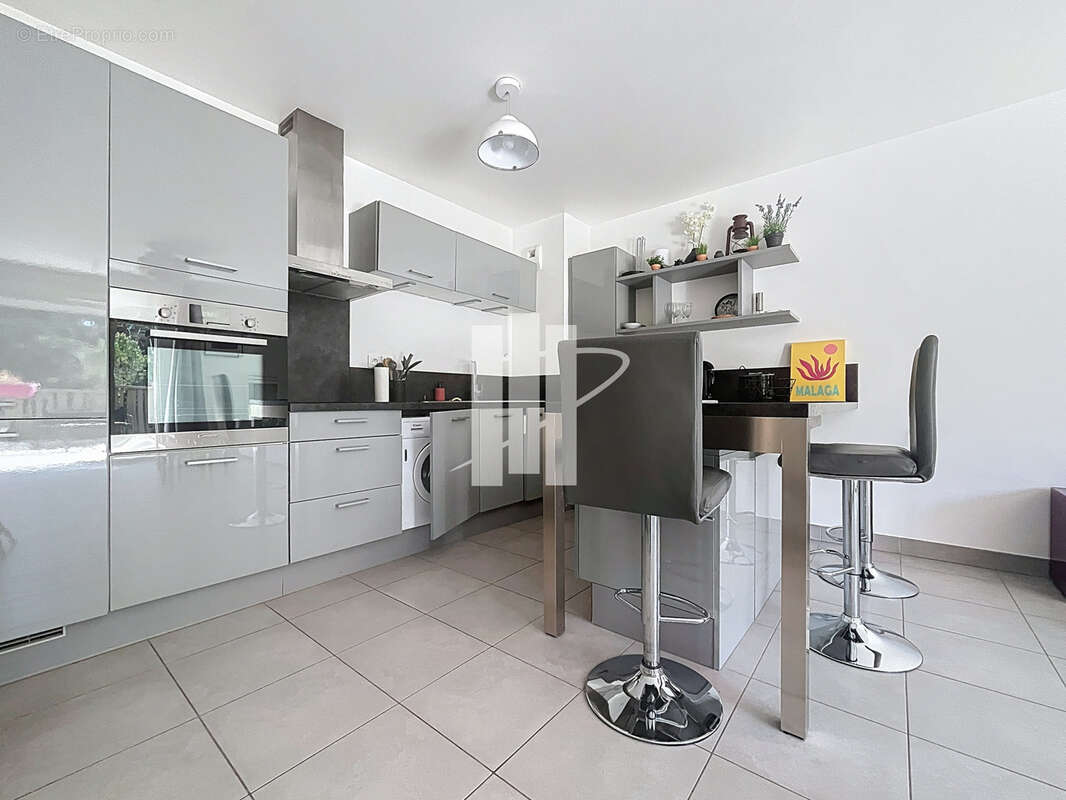 appartement au calme au deuxième étage avec grande terrasse sud vue dégagée - photo 4