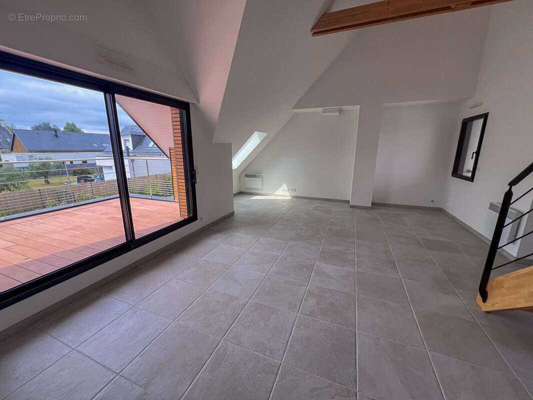 Appartement en duplex avec terrasse - photo 2