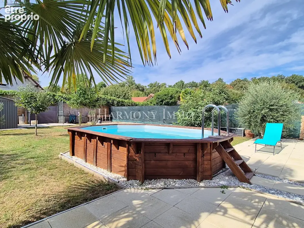 Maison de plain pied 4 pièces de 92 m2 avec piscine et jardin arboré - photo 3