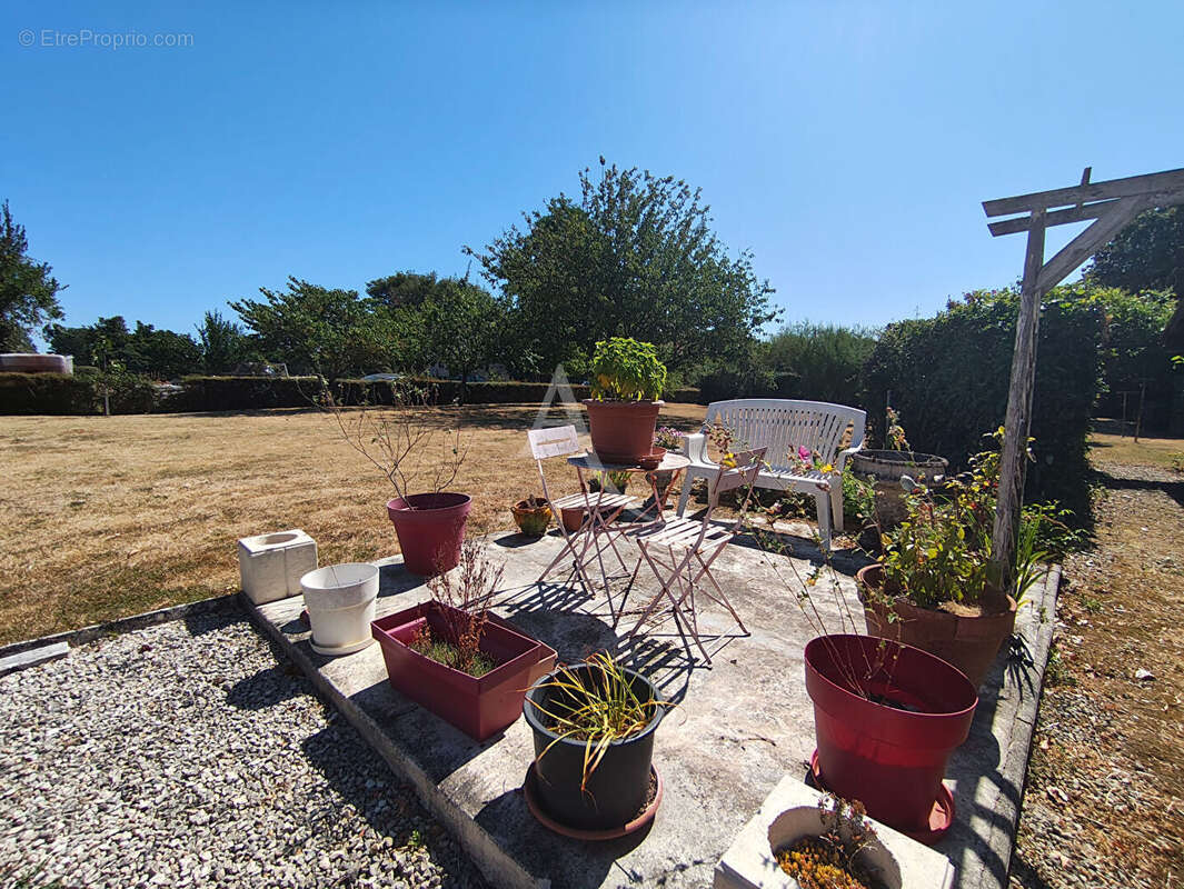 Maison à SOULIGNONNE