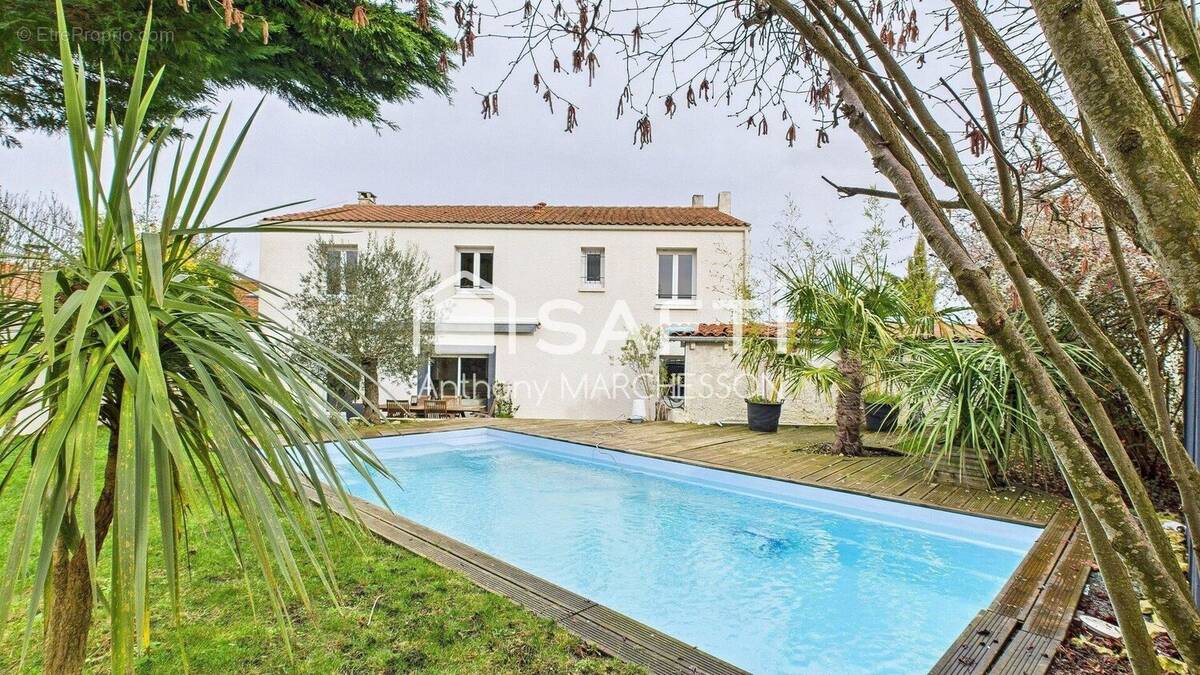 Photo 1 - Maison à PUILBOREAU