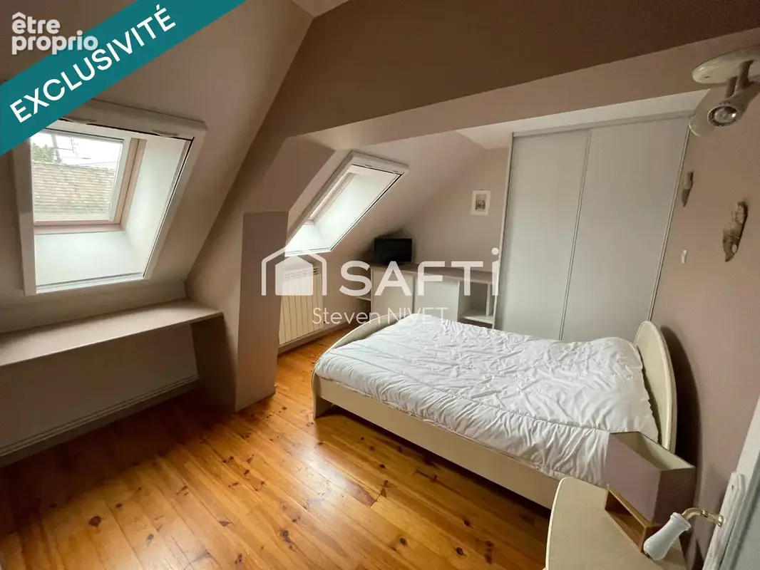 Photo 1 - Maison à SAINT-GENOU