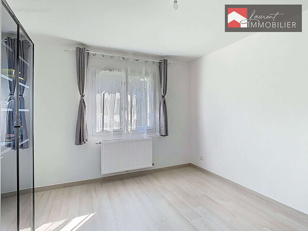 Villa de plain pied 3 chambres + Garage - 01190 CHEVROUX - photo 7