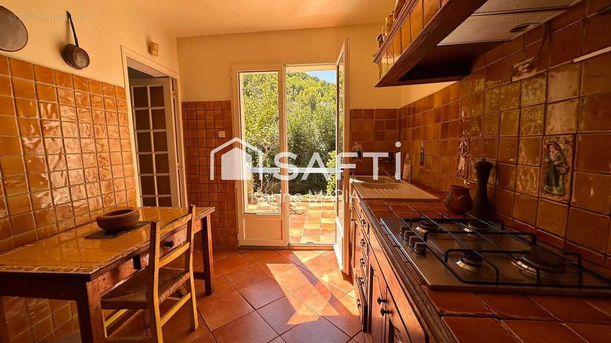 Photo 3 - Maison à ROQUEFORT-LA-BEDOULE