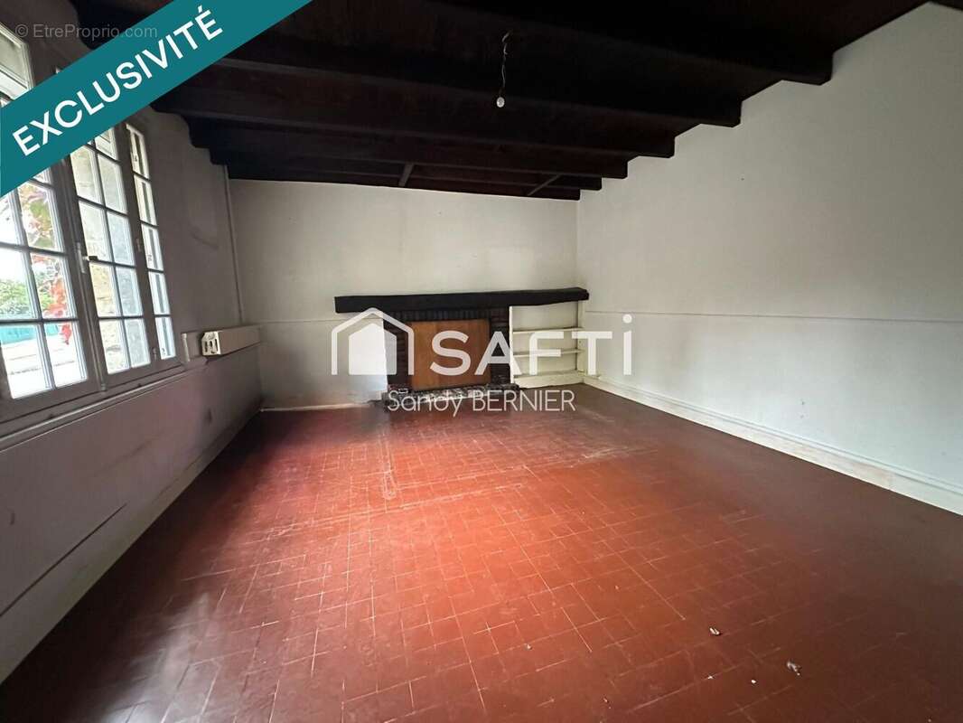 Photo 4 - Maison à ROCHES-PREMARIE-ANDILLE