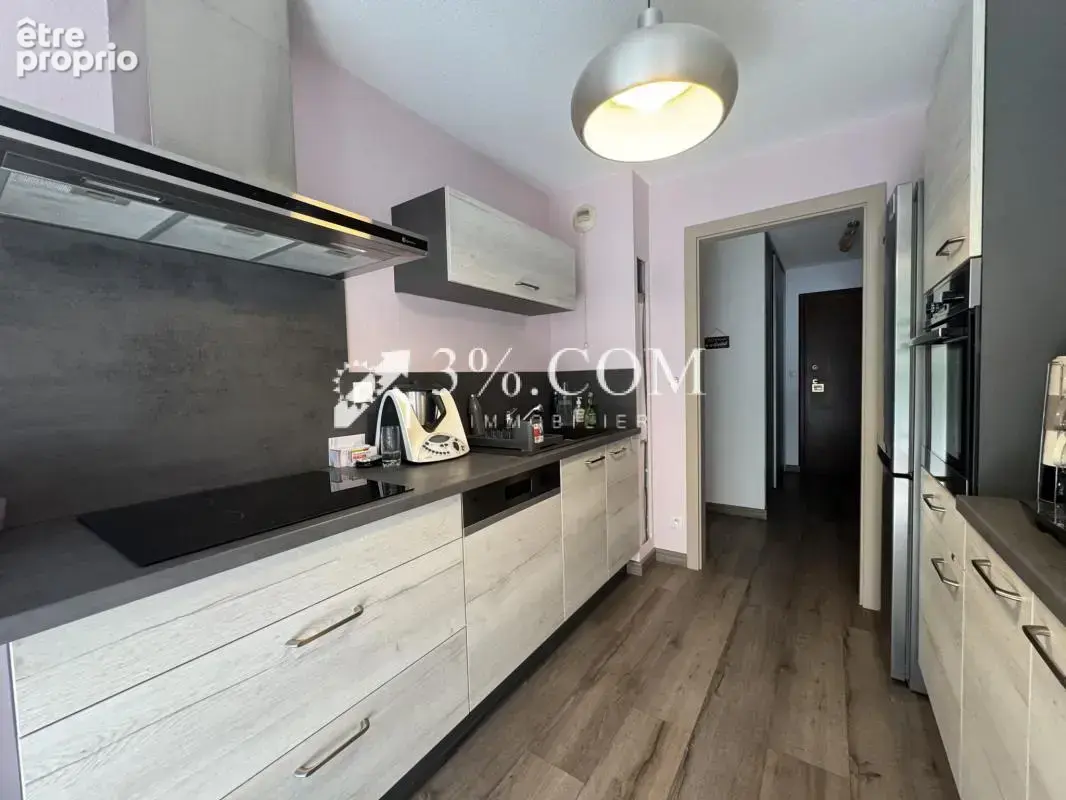 3%.COM - Appartement 2 pièces avec balcon, parking et cave - photo 7