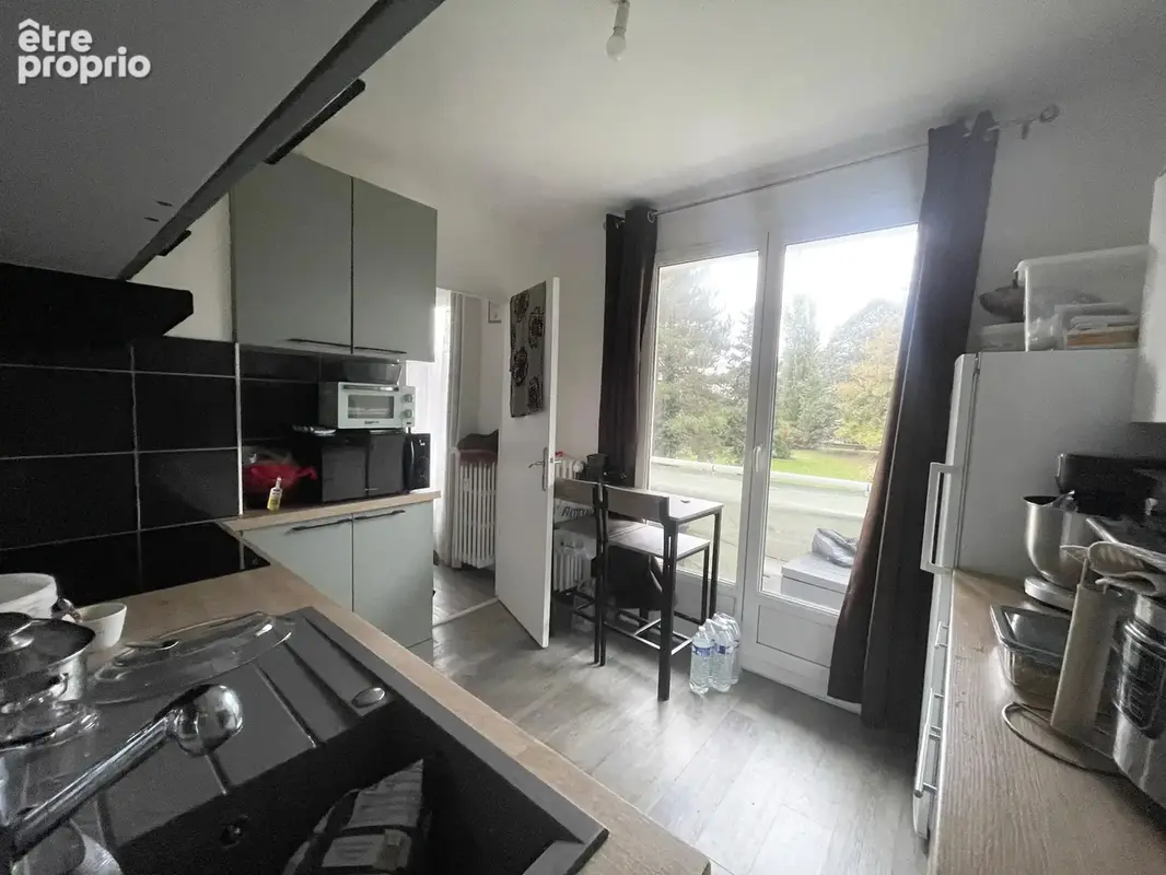 Appartement T4 avec balcon et cave - photo 4