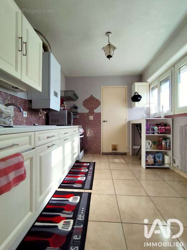 Appartement 65 m² à Saint-Jean-De-La-Ruelle  - photo 7