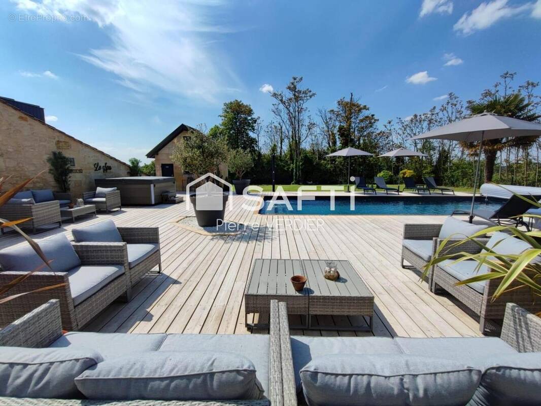 Photo 1 - Maison à PRIGNAC-ET-MARCAMPS