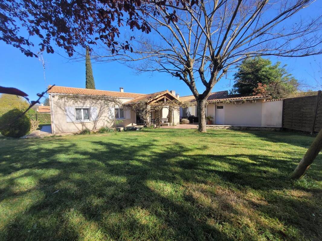 Photo 1 - Maison à VOUILLE