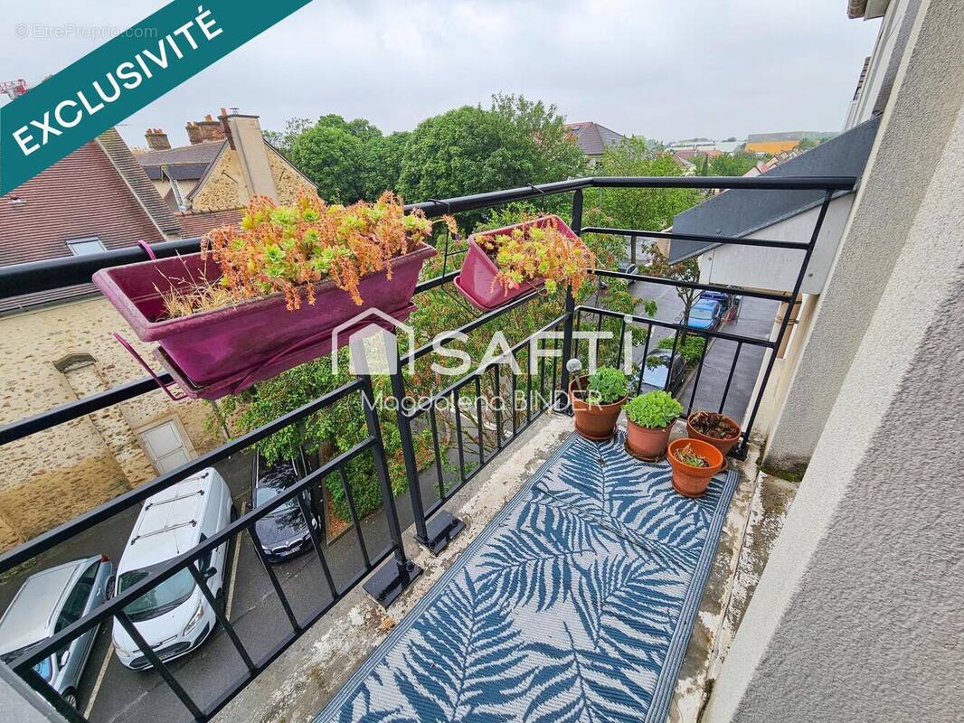 Photo 1 - Appartement à GRIGNY