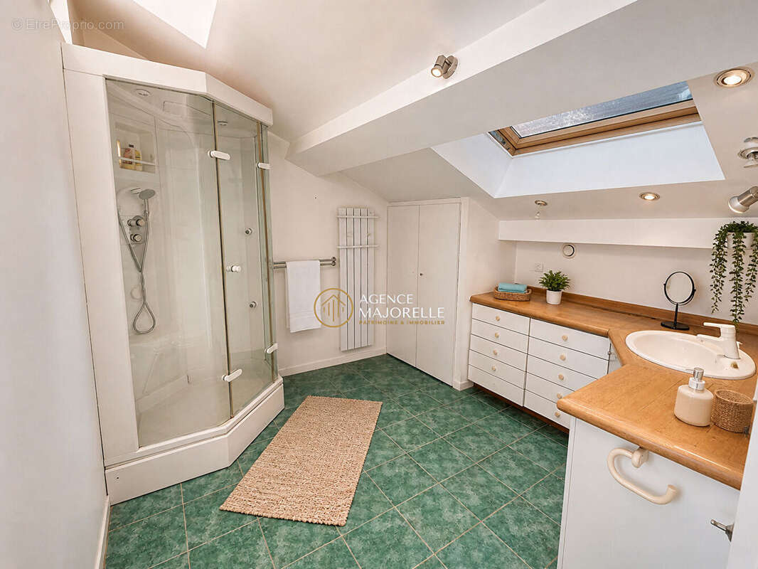 Appartement rénové avec climatisation proche des commodités - photo 12