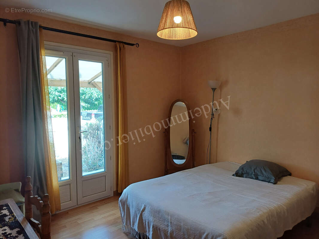 maison de plain-pied avec jardin et garage - photo 10