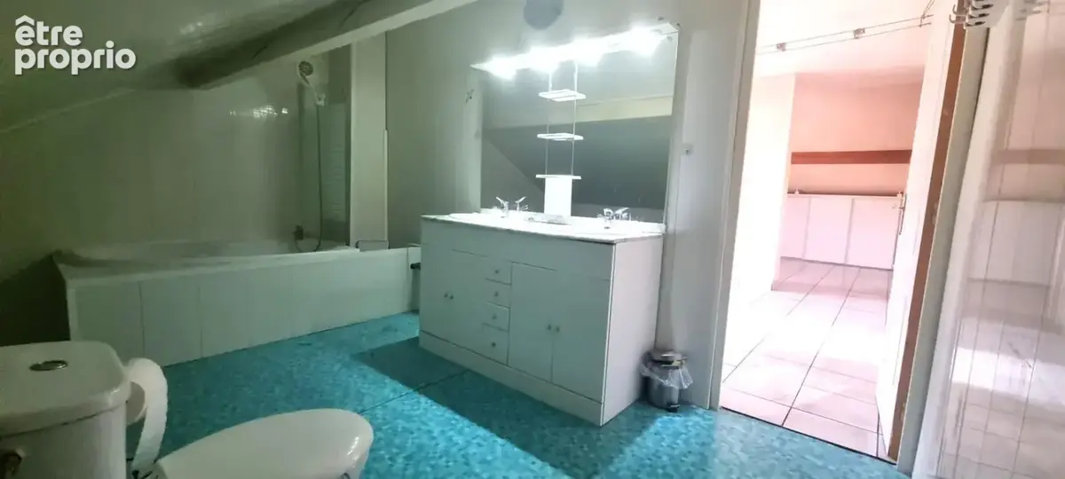 Grande maison familiale ou 2 appartements sur terrain d'environ 13 ares - photo 13