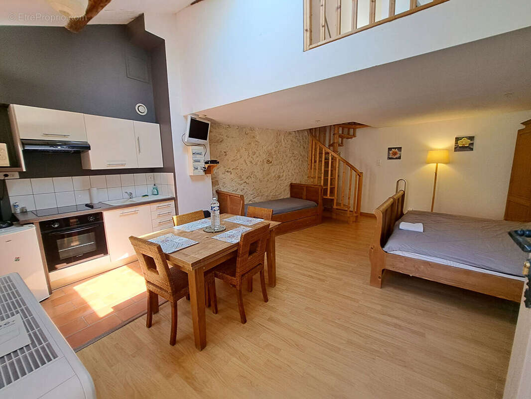 Appartement en duplex au coeur du village - photo 2