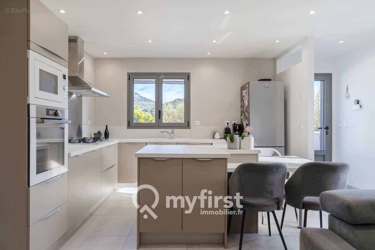 Un appartement entre jardin secret et rooftop suspendu - photo 7