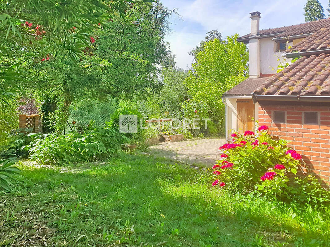 Maison de type 4  de 125 m² avec jardin. - photo 4
