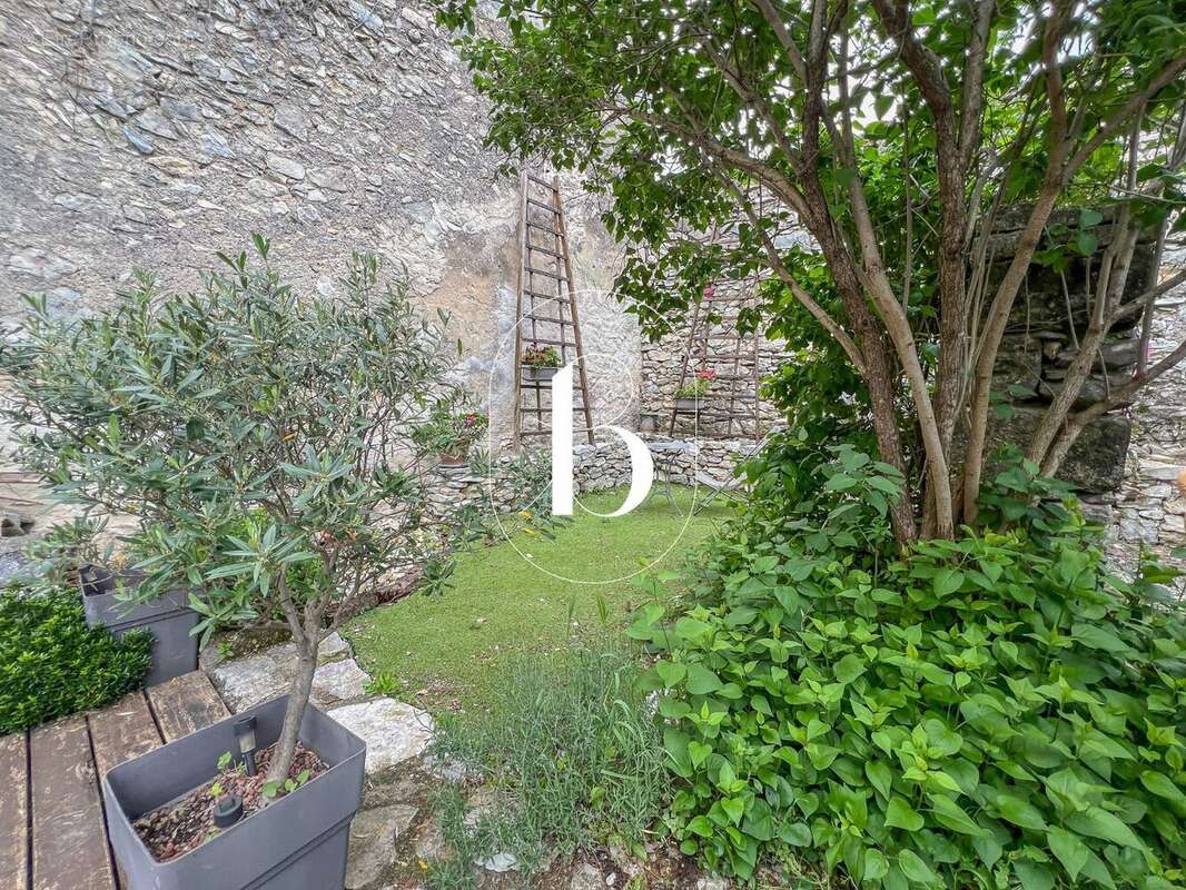 Maison 110 m² à Lussan  - photo 9