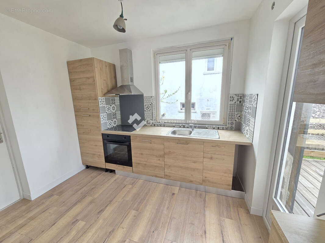 Maison 90 m² à Buxerolles  - photo 4