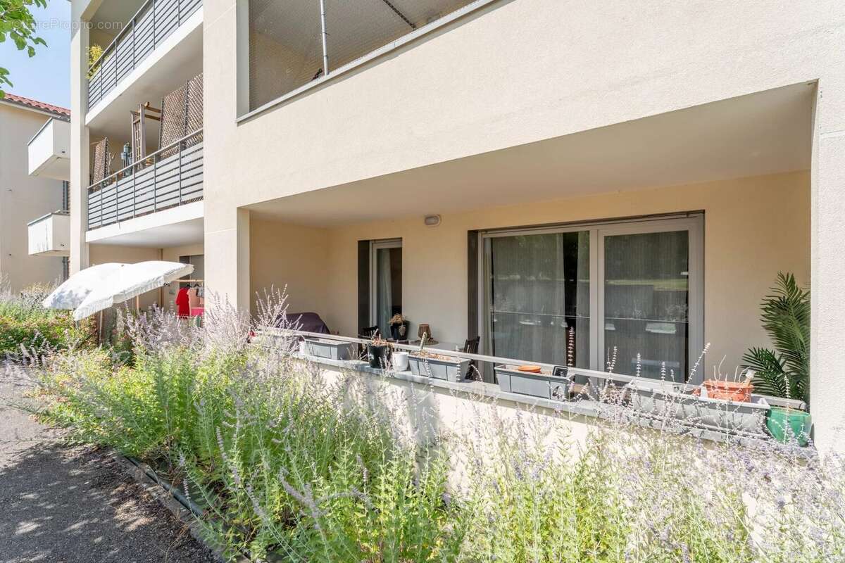 Appartement T4 avec terrasse et garage - photo 10
