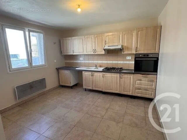 Maison 88 m² à Rouvray  - photo 4
