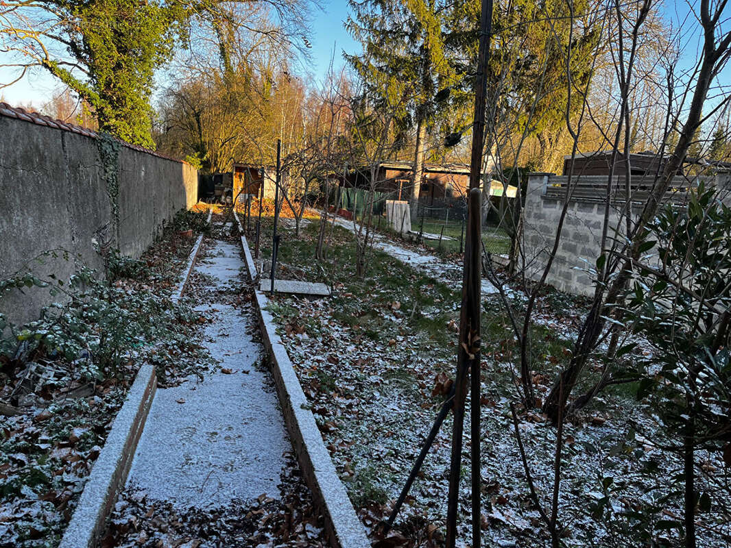 Maison  mitoyenne 4 pièce(s) 118 m2 jardin - photo 11