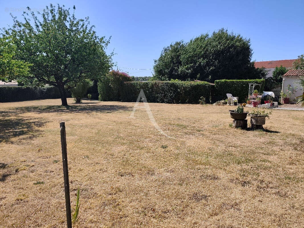 Maison à SOULIGNONNE