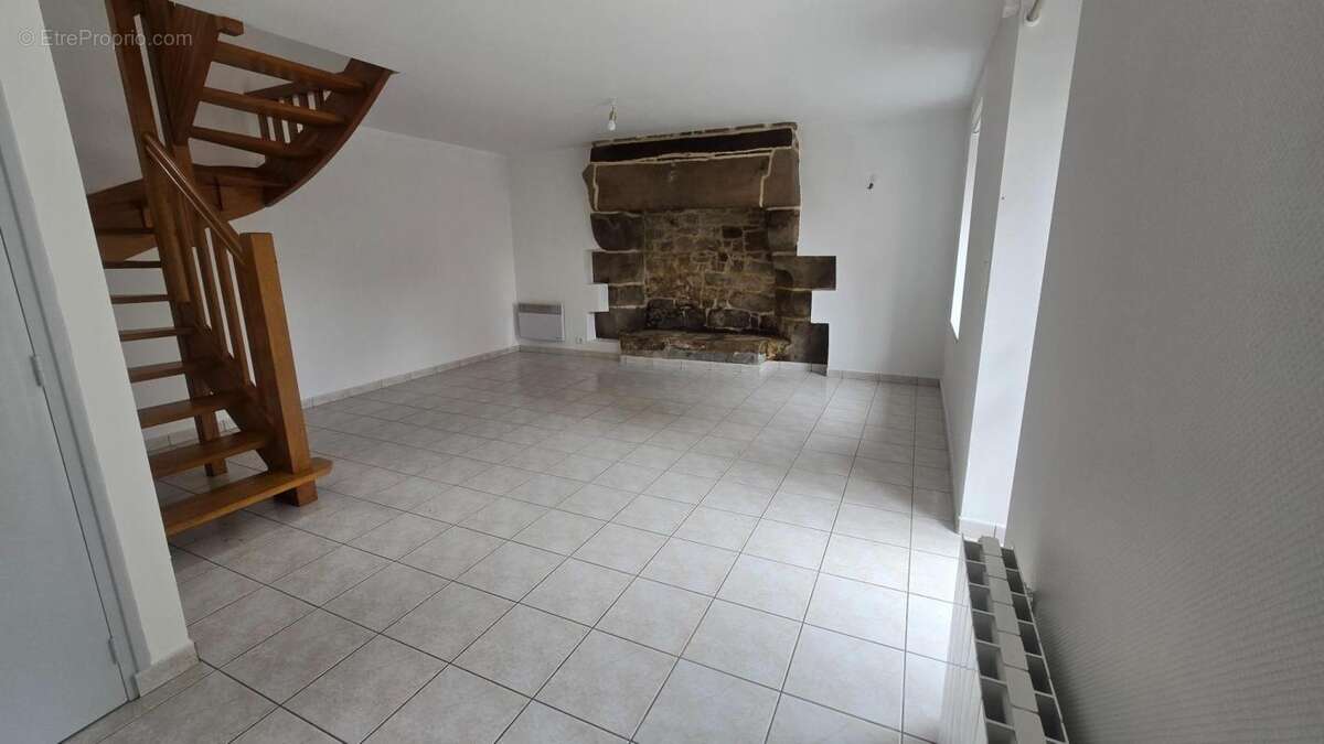 Maison de bourg avec rapport locatif - photo 2