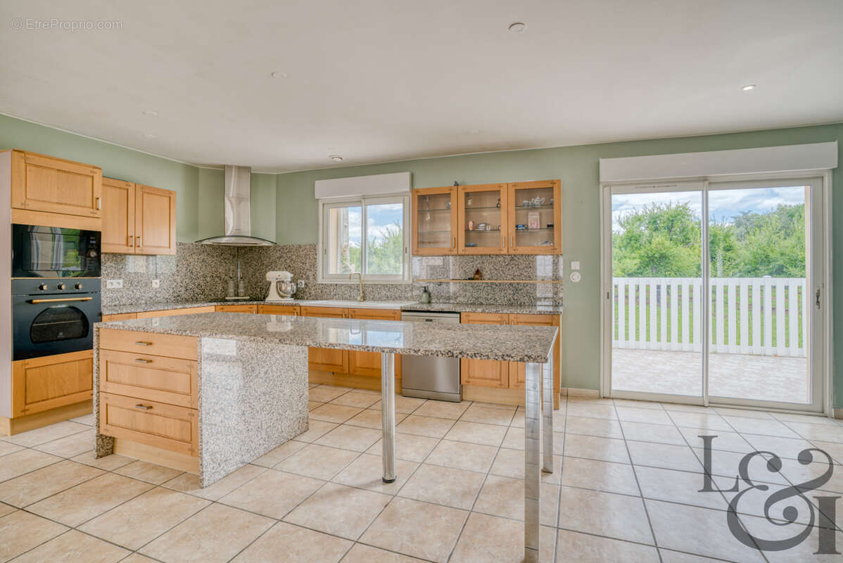 Maison de plain-pied à Sainte-Livrade-sur-Lot (Lot-et-Garonne, 47 ) - photo 4