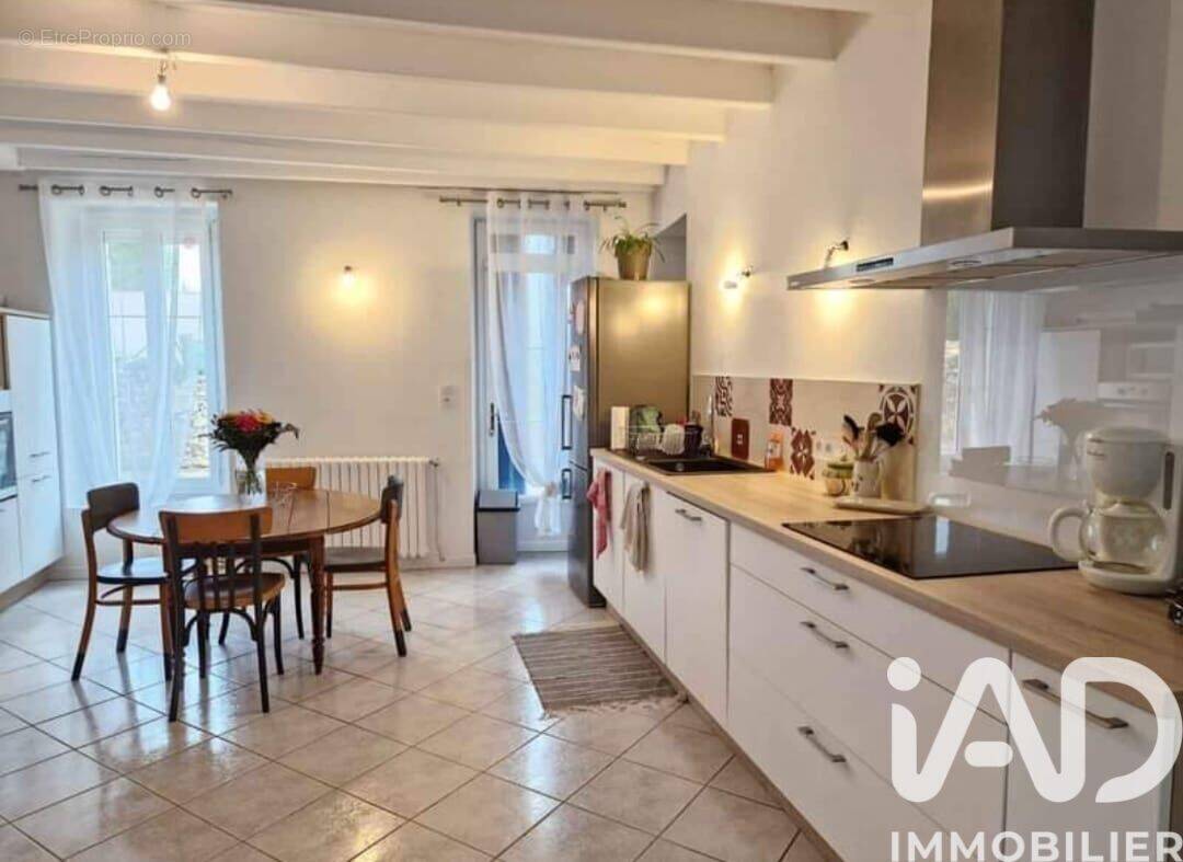 Photo 1 - Maison à ROCHES-PREMARIE-ANDILLE