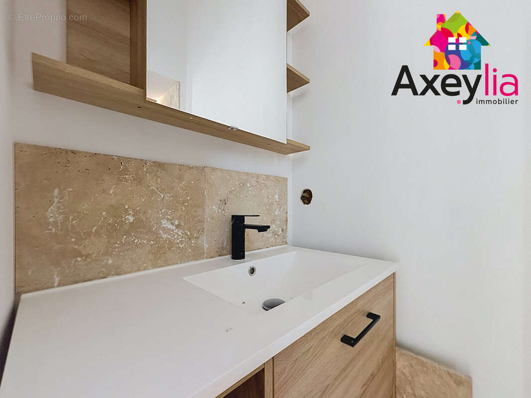 A vendre - riorges - appartement t3 entièrement rénové avec cabanon extérieur - photo 6