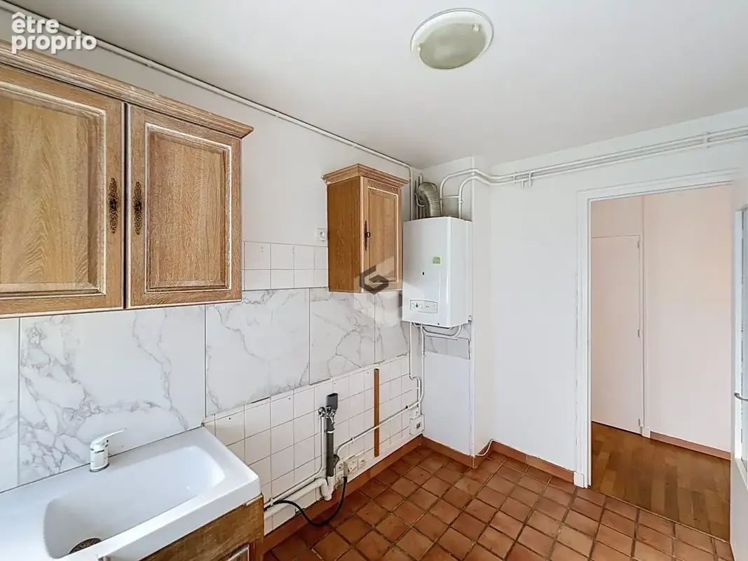 Appartement 4 pièces 66 m² à vendre à Reims (51100) - photo 7