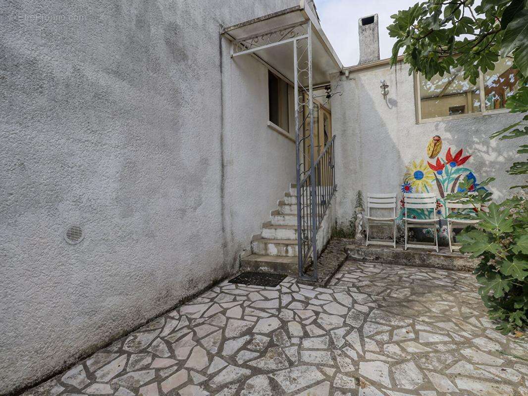 Maison de plain-pied de 110 m² - 3 chambres - Garage - Véranda -Terrain de 682 m² - photo 16
