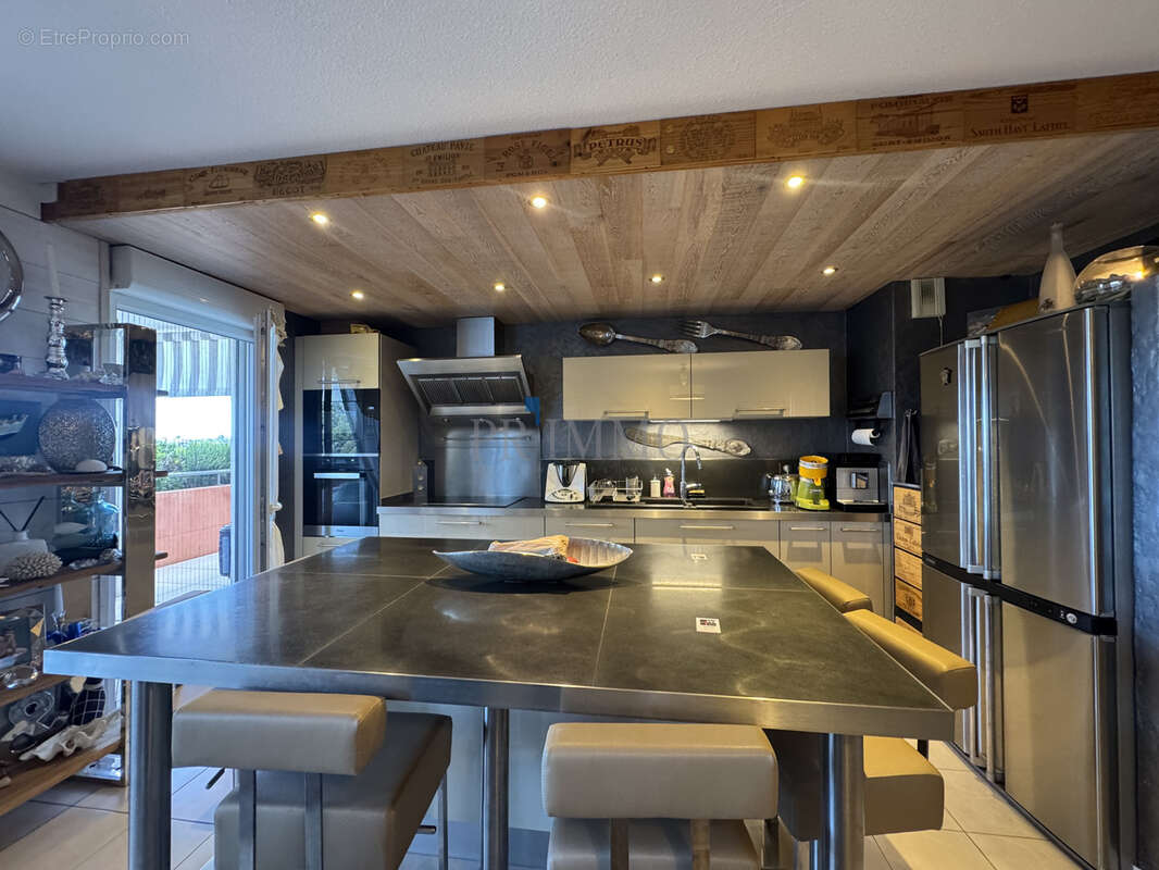 Appartement de type 4 - photo 2