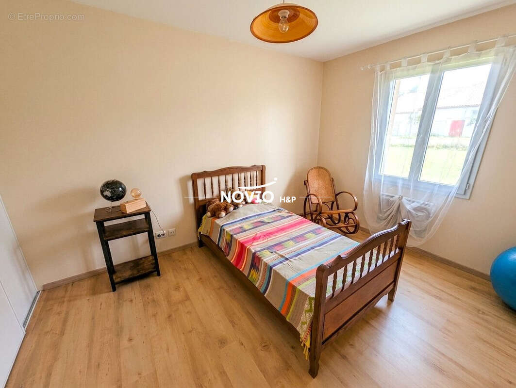 Maison 4 pièces 114 m² à vendre à Marigny-Brizay (86380) - photo 7