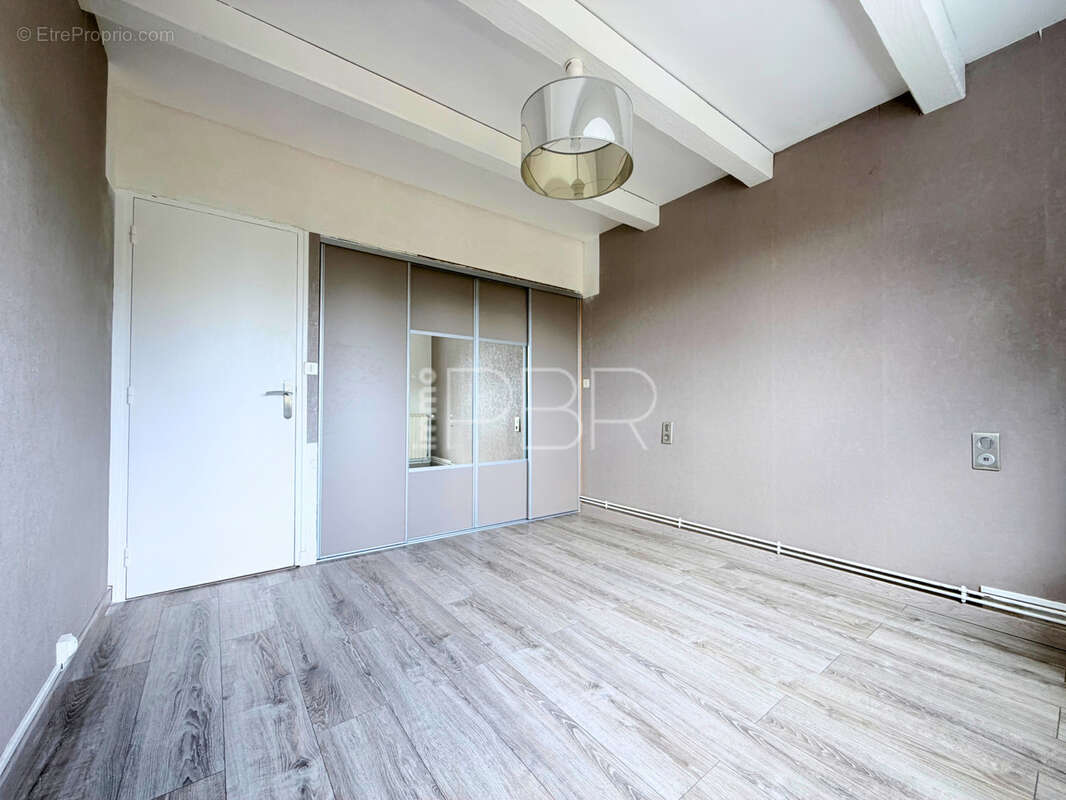 Appartement T3 avec cave - photo 8
