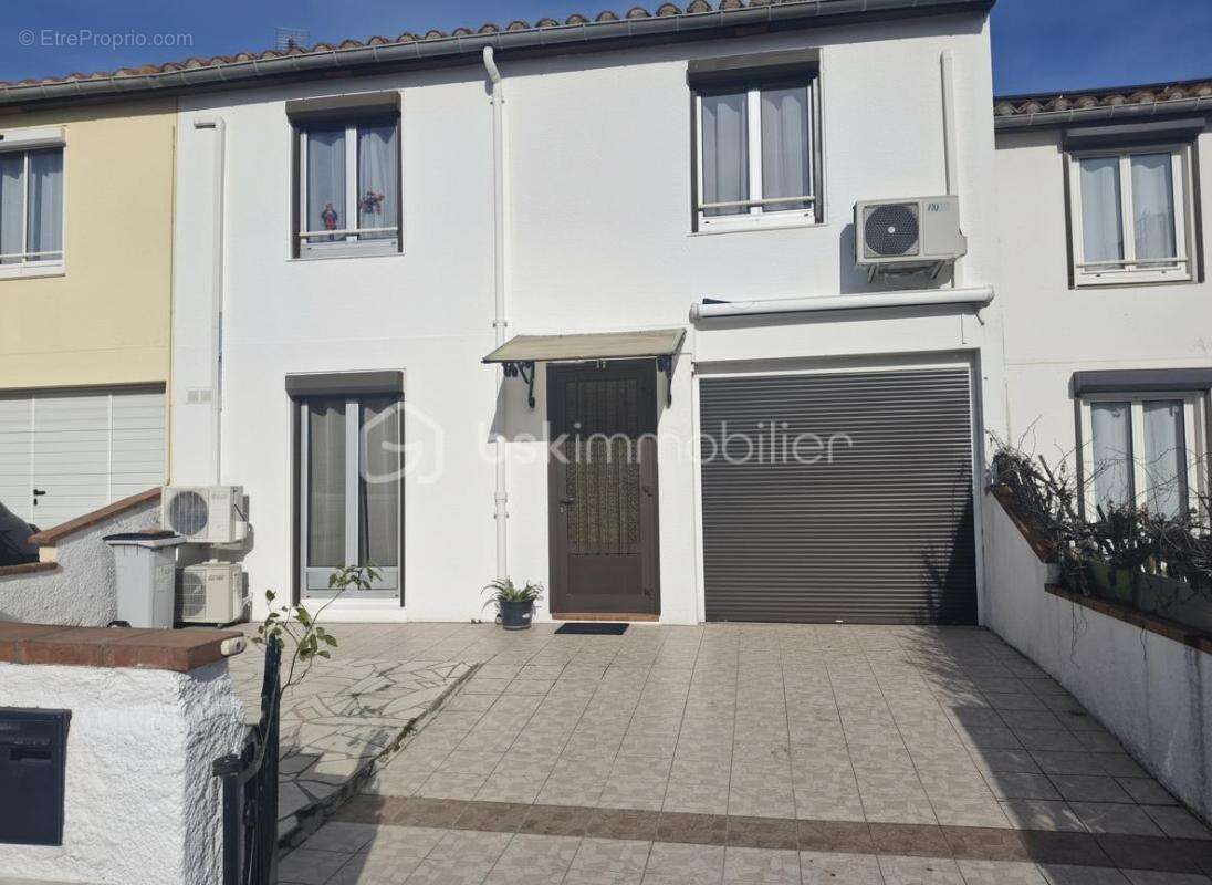 Maison en deux faces jardin et garage - photo 11