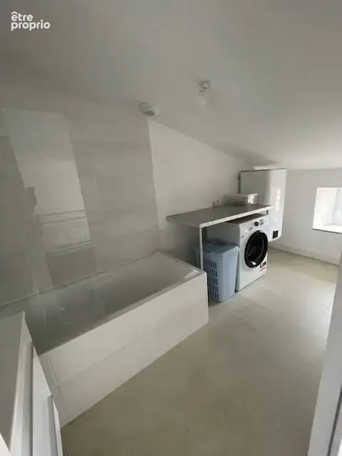 Immeuble de 3 appartements en centre bourg - photo 11
