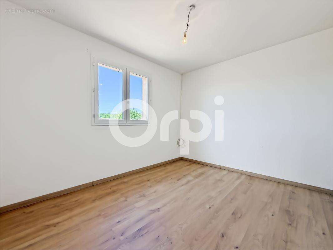 VENTE d'une maison F4 (101,2 m²) à RUOMS sur un terrain de 1125m² - photo 9