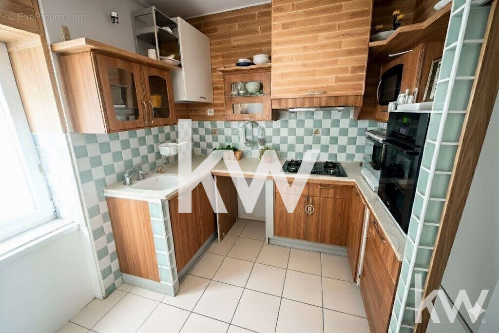 Appartement 100 m² à Saint-Etienne  - photo 2