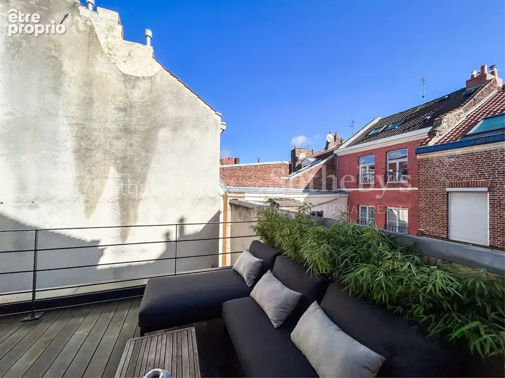 Superbe duplex rénové avec deux terrasses – Place des Archives - photo 4