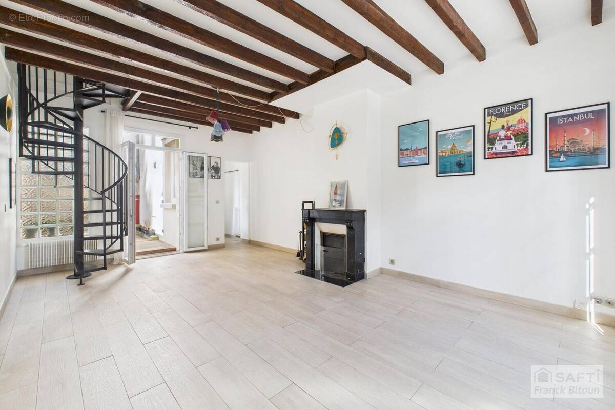 Photo 1 - Maison à COURBEVOIE