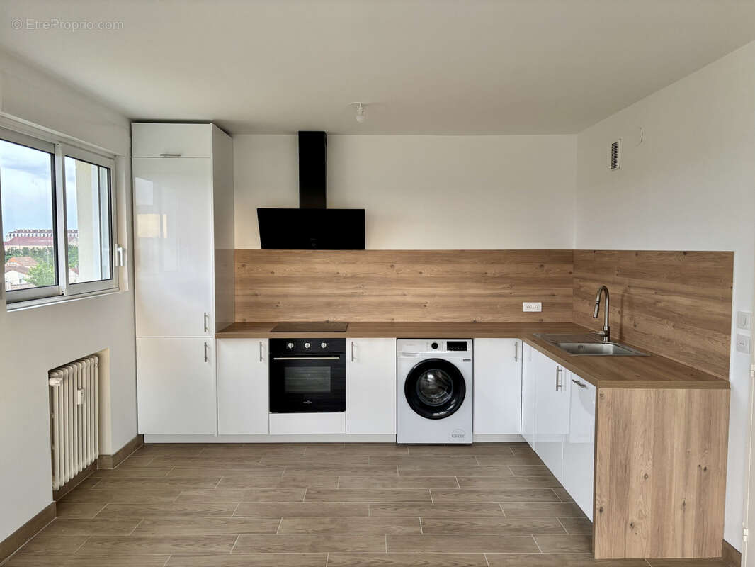Appartement de 65m2 + parking + cave - photo 2